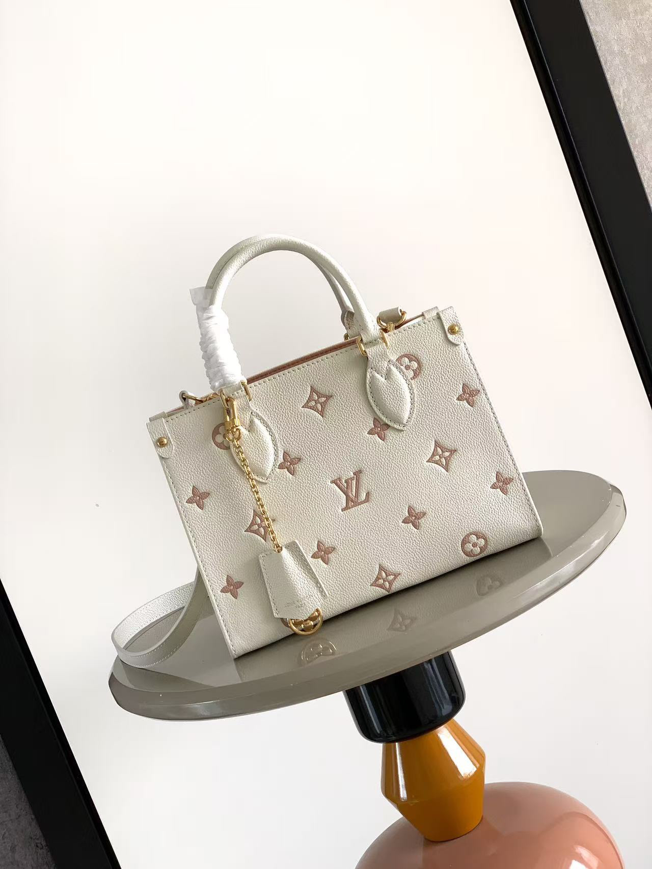 lv0221 Louis Vuitton M45653 M28313 OnTheGo Accessory Small with Dynamic Code